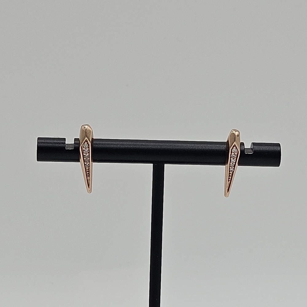 Kendra Scott rose gold spike earrings with clear crystals